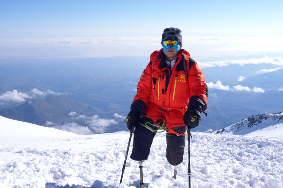 Xia Boyu climbing the 5642 meter high Mount Elbrus in the Caucasus.