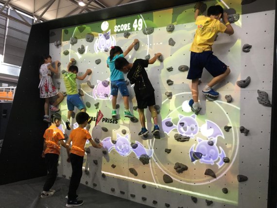 Augmented reality animates children to try out climbing