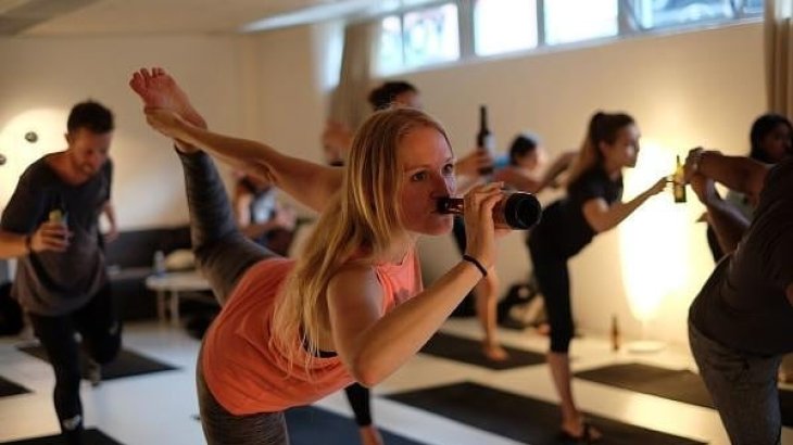 Beer Yoga is probably one of the most bizarre new yoga trends, involving balancing the beer on the head while maintaining balance on one foot.