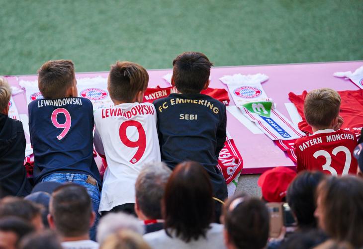 Boys in football merch
