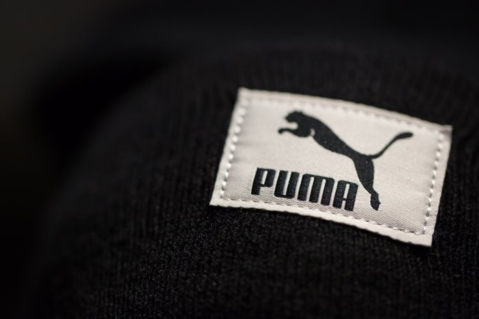 who owns the puma brand