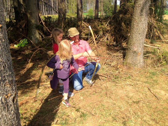 From the age of three, children can build bows and arrows and practice with them.