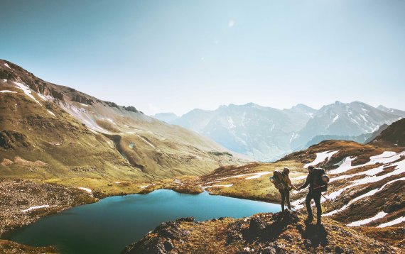 Hiker at the mountain lake