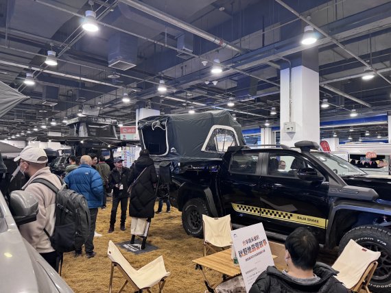 Rooftop tents and camper vans at ISPO Beijing 2024.