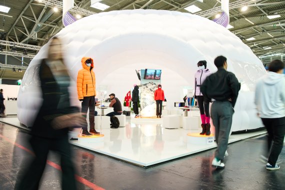 People in front of exhibition area, shopping