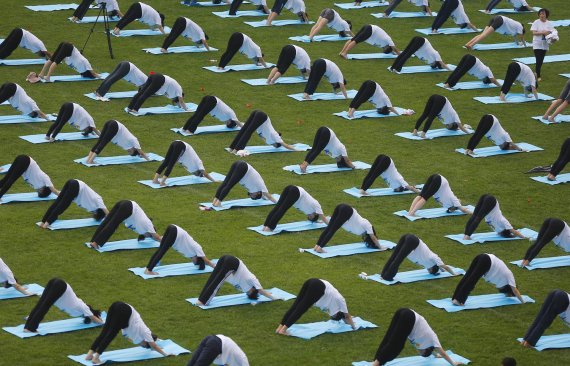 The popular sport of yoga: even though it seems odd, the Chinese love their exercises.