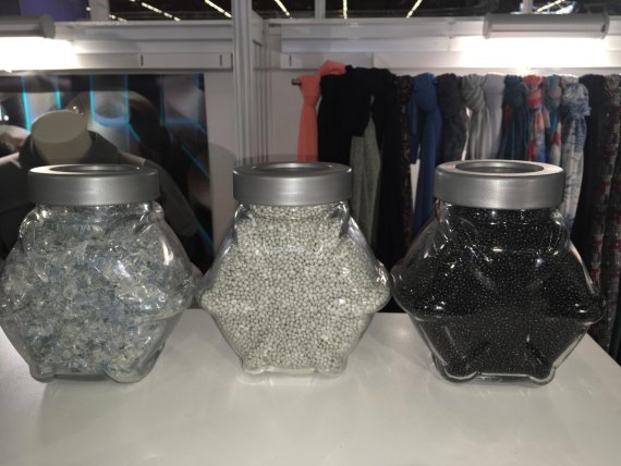 mb-170926-From left to right recovered plastic garbage from teh ocean floor is crushed into flakes, melted into pellets for extrusion or dye added for permanent color prior to extrusion of yarn Photo credit ISPOcom - From left to right recovered plastic garbage from teh ocean floor is crushed into flakes, melted into pellets for extrusion or dye added for permanent color prior to extrusion of yarn