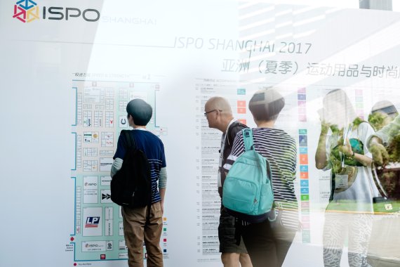 Visitors looking at the hall plan at ISPO Shanghai Visitors looking at the hall plan at ISPO Shanghai