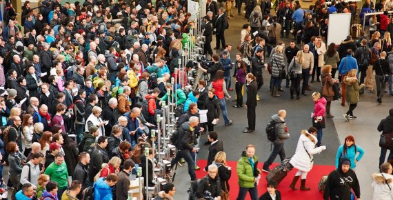 Attendance at the entrance of the ISPO Munich. Crowd at the entrance of ISPO Munich.