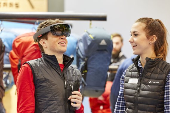 A participant is checking out VR at ISPO