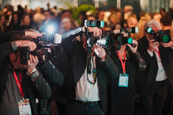 Fotografen in einer Reihe