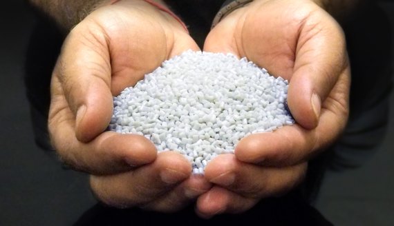 Pellets are produced from plastic collected from the oceans prior to being extruded as yarn. Pellets are produced from plastic collected from the oceans prior to being extruded as yarn.