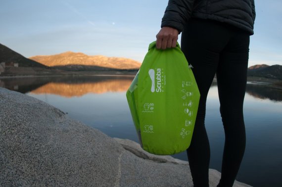 mb-EN-CampTrendxScrubba-10-e1441899760608 Scrubba Wash Bag with lake scenery in the background.