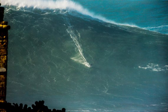 Almost goes down in the photo: Sebastian Steudtner surfing a mega-wave.