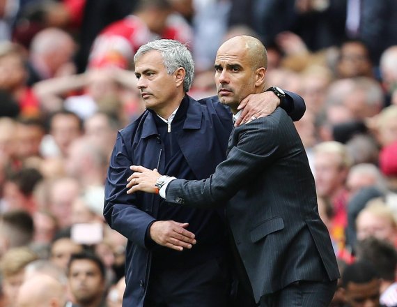 mb-guardiola-mourinho Jose Mourinho and Pep Guardiola at the Manchester derby