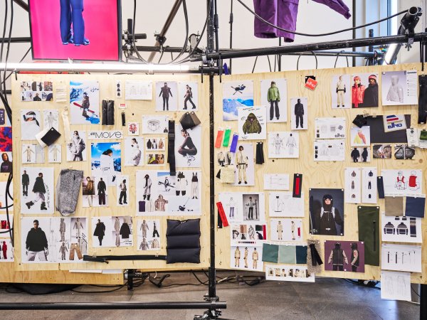 Pinboard with pictures, clothes and sketches