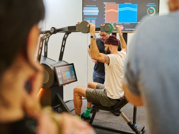 Man training his arms on a piece of sports equipment