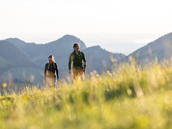 Two people hiking in the mountains