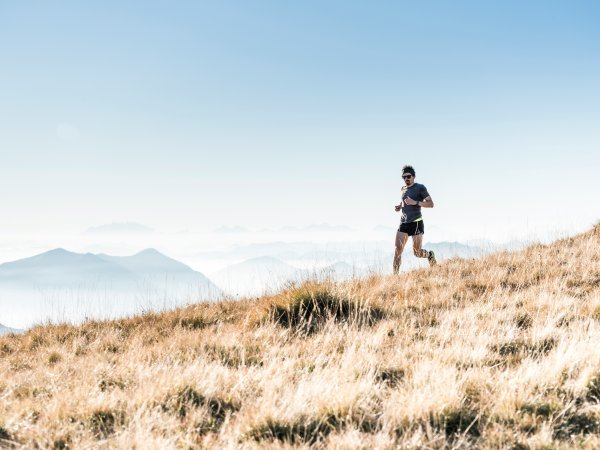 Person in the mountains while trail running