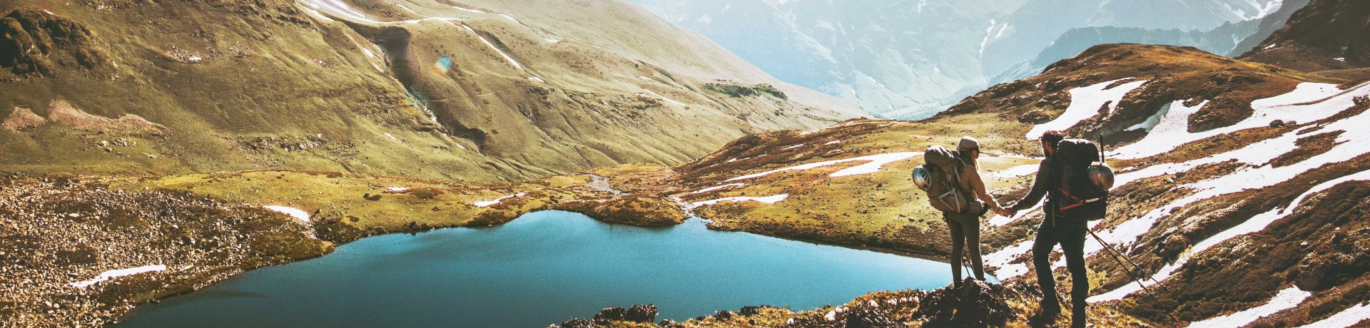 Hiker at the mountain lake