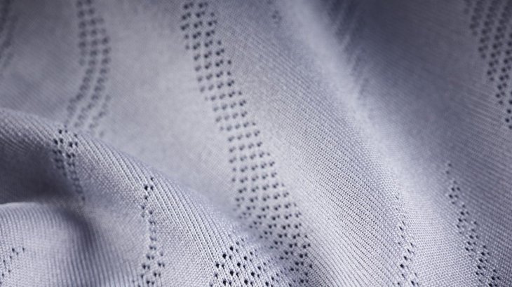 91% recycled polyester, 9% spandex, jacquard with a wicking finish. Major functions include lightweight, moisture management, breathable, quick drying and anti bacterial from TAS. 