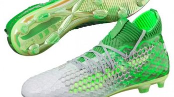 Green football shoes by Puma. 