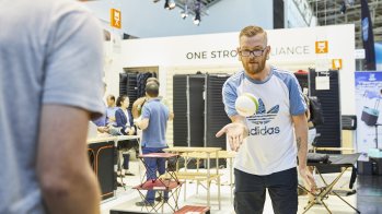 People trying ou table tennis at OutDoor by ISPO 2019.