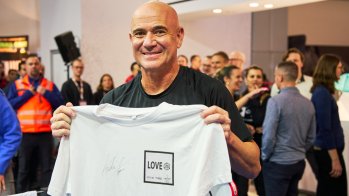 Andre Agassi with the "Love everyone" shirt