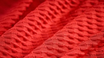 Seersucker textured knit with chemical-free cooling, wicking, thermal regulation and quick drying from Coolcore.