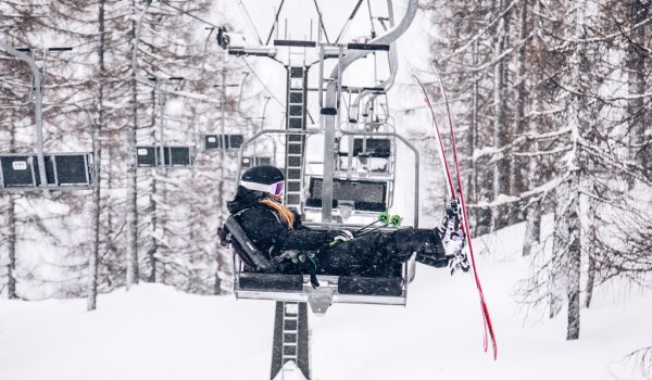 Birgit Ertl chilling on the lift with the new Mindbender skis.