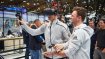 Model Lena Gercke (Mi.) und Manuel Neuer von Bayern München auf der ISPO München 2018