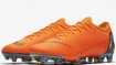 Orange football boot by Nike.