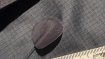 The patch on the inside of the jacket, which comes off Karl's jacket after only one week.