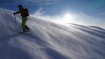 Karl with the jacket in rough conditions on the way to the mountain peak, where about 60 km/h strong wind blew hard snow into his face.