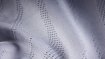 91 % recyceltes Polyester, 9 % Elastan, Jacquardgewebe mit schweißableitender Veredelung. Wichtigste funktionale Eigenschaften sind u. a. geringes Gewicht, feuchtigkeitsregulierend, atmungsaktiv, schnelltrocknend und antibakteriell von TAS.