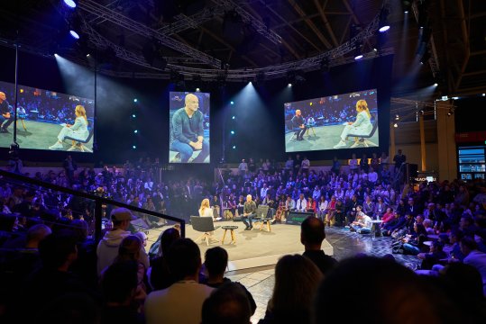 121724_The power of sport: Uniting vibrant communities globally_Header Audience watches interview with Andre Agassi
