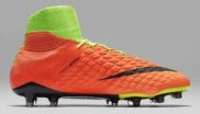 Orange football boot by Nike. 