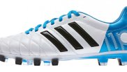 Blue and white Adidas adipure football boot. 