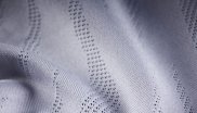 91% recycled polyester, 9% spandex, jacquard with a wicking finish. Major functions include lightweight, moisture management, breathable, quick drying and anti bacterial from TAS. 