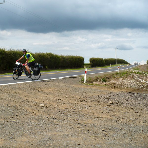 On the road in New Zealand by bicycle.