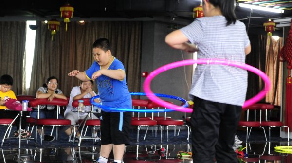 In China sind immer mehr Kinder von Fettleibigkeit bedroht.