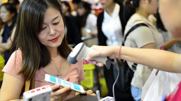 Cashless payment via WeChat Pay celebrates its German premiere at Munich Airport.