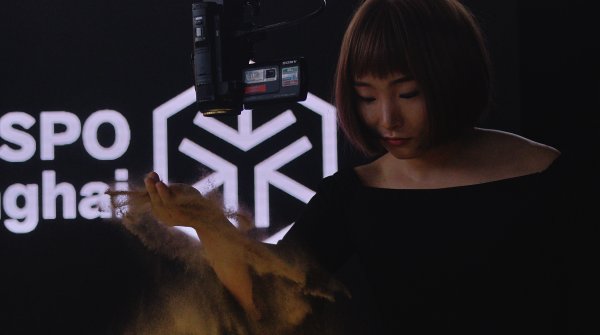 Sand artist at ISPO Shanghia