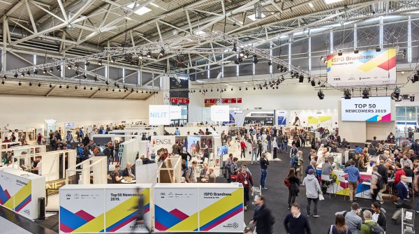  Many visitors in a hall of the Munich Trade Fair Centre during the ISPO.