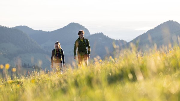 Two people hiking in the mountains