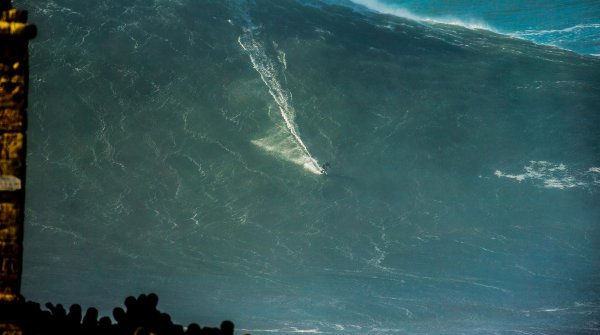 Almost goes down in the photo: Sebastian Steudtner surfing a mega-wave.