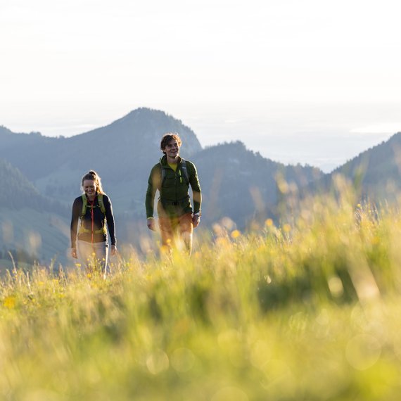 Two people hiking in the mountains