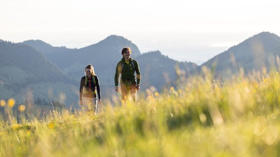 Two people hiking in the mountains