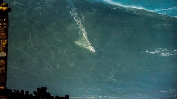 Almost goes down in the photo: Sebastian Steudtner surfing a mega-wave.